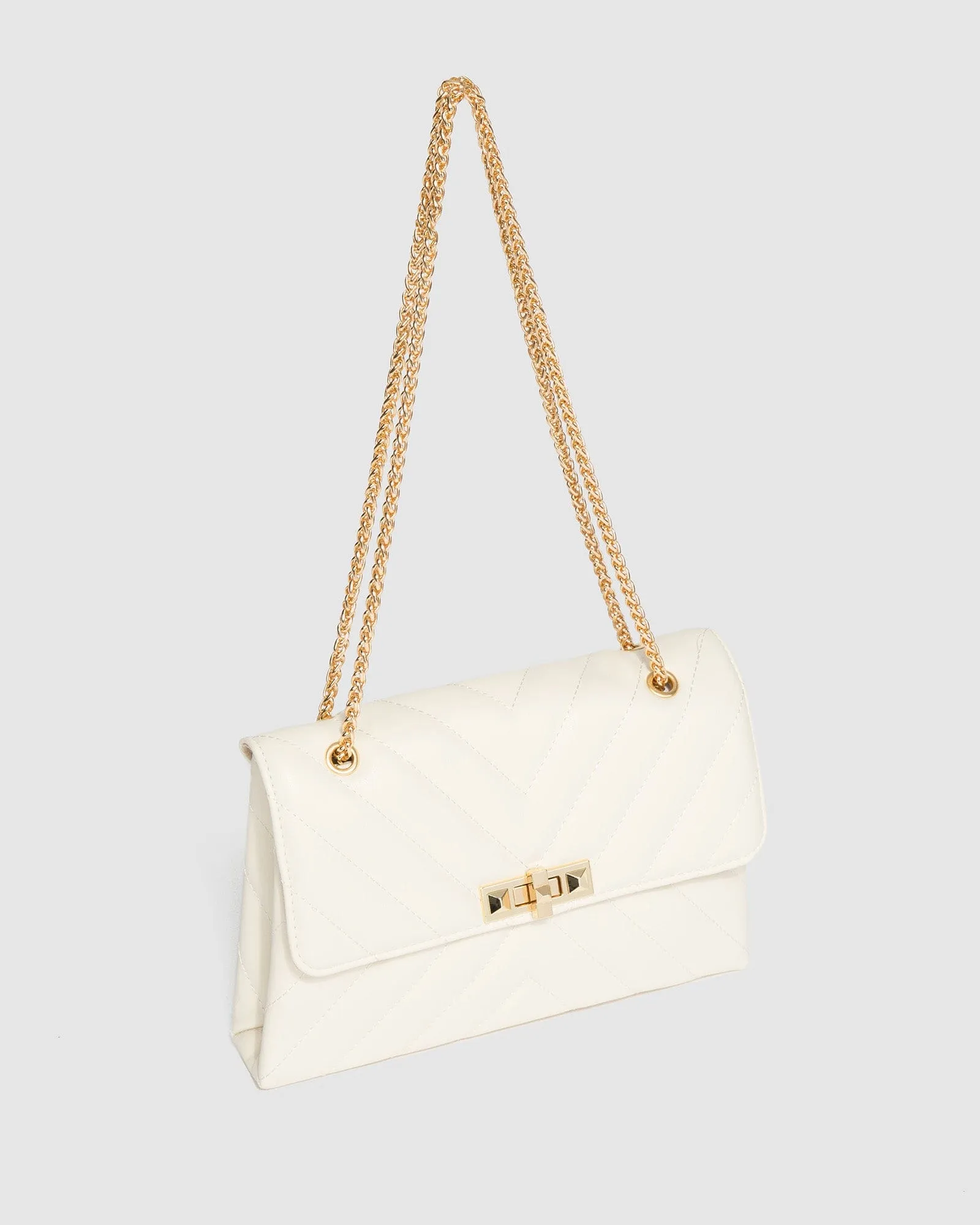 Ivory Zion Arrow Crossbody Bag